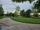 Picturesque view of a winding sidewalk through a vibrant community park at 20058 E Dartmouth Dr, Aurora, CO 80013