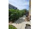 A walkway leads to a BBQ in this peaceful backyard setting at 20058 E Dartmouth Dr, Aurora, CO 80013
