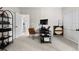 A bedroom setup as an office featuring a computer, desk, and closet at 20740 Parker Vista Rd, Parker, CO 80138