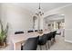 Spacious dining area boasts modern furnishings, ample seating, and an open view into other living spaces at 20740 Parker Vista Rd, Parker, CO 80138