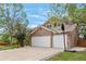 Two-story home with attached two-car garage, a basketball hoop, and well-maintained lawn at 20740 Parker Vista Rd, Parker, CO 80138
