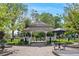 Community gazebo and seating in a beautiful park-like setting, perfect for relaxation at 20740 Parker Vista Rd, Parker, CO 80138