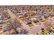 Aerial view showcasing the home, landscaping, and neighborhood at 5000 W Dakota Ave, Denver, CO 80219