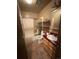 Bathroom featuring shower-tub combination, single sink vanity and open shelving at 2986 W 119Th Ave, Westminster, CO 80234