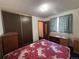 Bedroom featuring a closet and natural light from the window at 2986 W 119Th Ave, Westminster, CO 80234