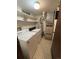 Laundry room area with washer, dryer, shelving, and utilities at 2986 W 119Th Ave, Westminster, CO 80234