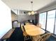 Open-concept living room and dining area with natural light, fireplace, and cozy furniture at 2986 W 119Th Ave, Westminster, CO 80234