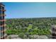 Expansive aerial view of lush green space and park extending into the distance from a high vantage point at 8100 E Union Ave # 1502, Denver, CO 80237