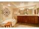 A stunning bathroom with a soaking tub and double vanity at 8100 E Union Ave # 1502, Denver, CO 80237