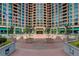 Attractive condominium complex with brick facade and inviting courtyard entrance at 8100 E Union Ave # 1502, Denver, CO 80237