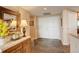 Inviting foyer with tile flooring, console table, and decorative mirror at 8100 E Union Ave # 1502, Denver, CO 80237