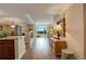 Inviting foyer with hardwood floors and an open floor plan transitioning into the living area at 8100 E Union Ave # 1502, Denver, CO 80237