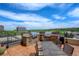 Outdoor kitchen with built-in grills and countertop, ideal for summer barbecues with city views at 8100 E Union Ave # 1502, Denver, CO 80237