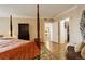 Bright main bedroom boasts hardwood floors and walk-in closet access at 8100 E Union Ave # 1502, Denver, CO 80237