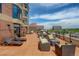 Wide patio area featuring comfortable lounge furniture, perfect for entertaining and relaxation on a sunny day at 8100 E Union Ave # 1502, Denver, CO 80237