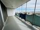 Covered balcony offering scenic views of the surrounding buildings and blue skies at 1155 N Ash St # 908, Denver, CO 80220