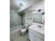 Bathroom featuring tub with tiled walls, sleek vanity, and modern finishes at 1155 N Ash St # 908, Denver, CO 80220