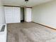 Spacious bedroom features neutral carpet and ample closet space for organized storage at 1155 N Ash St # 908, Denver, CO 80220