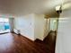 Bright room with wood floors leading to a private balcony with good natural light at 1155 N Ash St # 908, Denver, CO 80220