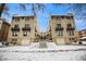 Exterior of an apartment building with multiple units, balconies, and snow-covered grounds at 960 N Sherman St # 2G, Denver, CO 80203