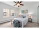 Bright bedroom featuring a ceiling fan, natural light and comfortable bedding at 960 N Sherman St # 2G, Denver, CO 80203