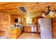 Charming wood kitchen featuring stainless steel appliances and beautiful countertops, perfect for Gathering meals at 10893 Milliken Ave, Conifer, CO 80433