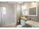 Bathroom with white subway tile and updated fixtures at 10527 W 69Th Pl, Arvada, CO 80004