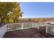 Deck overlooking scenic mountain views and autumn foliage at 10527 W 69Th Pl, Arvada, CO 80004