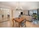 Open-concept dining area with mirrored closet doors for an enhanced sense of space at 800 N Pearl St # 1109, Denver, CO 80203
