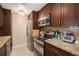 Well-equipped kitchen featuring stainless steel appliances and granite countertops at 800 N Pearl St # 1109, Denver, CO 80203