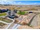 An aerial view of the farmhouse featuring an expansive garden and scenic surroundings at 39743 Penn Rd, Elizabeth, CO 80107