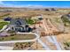 Charming two-story home with landscaped yard and community garden on a sunny day at 39743 Penn Rd, Elizabeth, CO 80107