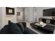Comfortable living room featuring modern furniture, a media console, and seamless access to the hallway at 39743 Penn Rd, Elizabeth, CO 80107