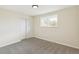 Cozy bedroom with window and closet offering comfort and functionality at 8622 W Warren Ln, Lakewood, CO 80227