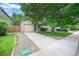 Charming single-Gathering home with a well-maintained front yard, a mature shade tree, and a one-car attached garage at 5602 S Yank Ct, Littleton, CO 80127