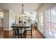 Open concept dining area flows into the living room and features access to the deck at 6275 Lakewood Rd, Parker, CO 80134