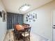 Well-lit dining room features a skylight, modern track lighting, and a collection of mirrors at 6275 Lakewood Rd, Parker, CO 80134