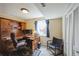 Basement office with built-in desk, drawers, and cabinets for storage at 6275 Lakewood Rd, Parker, CO 80134