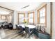 Bright dining area with a bay window, built-in bench seating, and modern pendant lighting at 186 Rachel Ln, Breckenridge, CO 80424