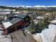 Beautiful mountain home with a two-car garage, surrounded by snow and scenic mountain views at 186 Rachel Ln, Breckenridge, CO 80424
