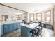 Modern kitchen featuring white cabinets, stainless appliances, and a spacious island at 186 Rachel Ln, Breckenridge, CO 80424