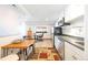 Small kitchen with stainless appliances open to office and living space at 186 Rachel Ln, Breckenridge, CO 80424