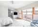 Bright main bedroom with balcony access, en-suite bath, and ample natural light at 186 Rachel Ln, Breckenridge, CO 80424