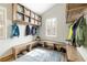 Mudroom with ample storage, wooden benches, cubbies, and natural light at 186 Rachel Ln, Breckenridge, CO 80424