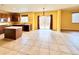 Kitchen with island and stainless steel appliances at 9821 Mobile St, Commerce City, CO 80022