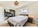 Comfortable bedroom with natural light, closet and contemporary furnishings, perfect for relaxation at 3225 S Garrison St # 9, Lakewood, CO 80227