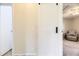 Charming bedroom featuring a sliding barn door at 3225 S Garrison St # 9, Lakewood, CO 80227