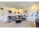Inviting living room featuring a spacious layout, modern decor, and cozy seating arrangements at 3225 S Garrison St # 9, Lakewood, CO 80227