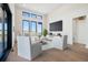 Elegant living room with large windows, comfortable seating, and scenic views at 5741 Doc Bar Circle, Larkspur, CO 80118