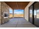 Covered outdoor patio with views at 5741 Doc Bar Circle, Larkspur, CO 80118